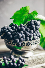 Grapes still life on wooden table