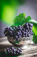 Grapes still life on wooden table