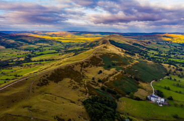 Panorama of welsh countryside. British landscape. Aerial panoramic view of typical british farmers fields and some sheep. England UK. Scenic British Countryside at Summer. 