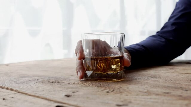 Alcoholism concept. Young man drinking alcohol too much. drunk asian man hold whisky glass addicted alcohol need therapy.