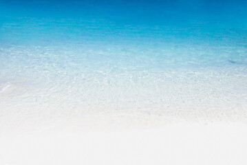 Fototapeta na wymiar Soft wave of turquoise water in Aruba