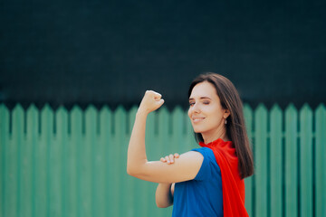 Strong Super Heroine Woman Showing of Her Biceps . Vigilante superhero defending her neighborhood...