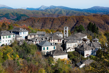 Autumnal landscape showing the stone houses of traditional architecture in the village of Dilofo in Epirus, Greece