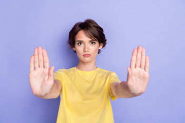 Photo of young attractive pretty gorgeous nice woman serious face showing two palms asking stop...