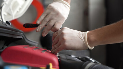 auto mechanic repairs car engine. car service. close-up.