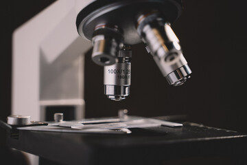 Microscope in laboratory science closeup research. Laboratory of biology by biotechnology for analysis, experiment, education and test.
