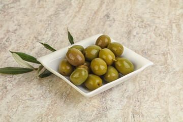 Tasty marinated olives in the bowl