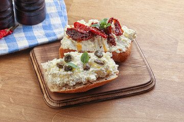 bruschetta with soft cheese capers and tomato