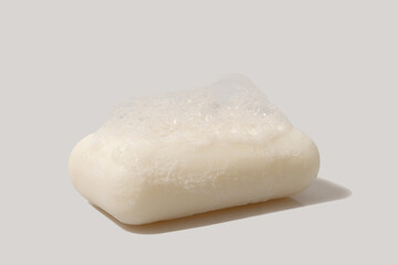 White soap with hard shadow. Detergent and body care.
