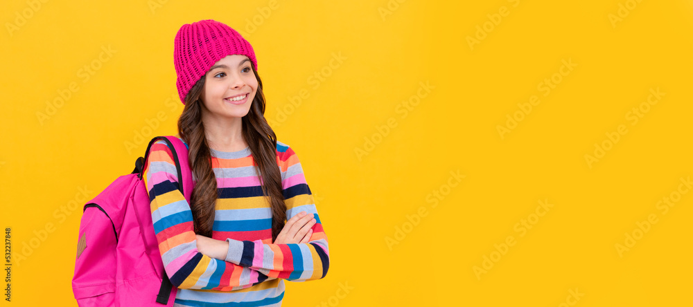 Wall mural happy hipster teen girl with backpack going to school, education. portrait of schoolgirl student, st