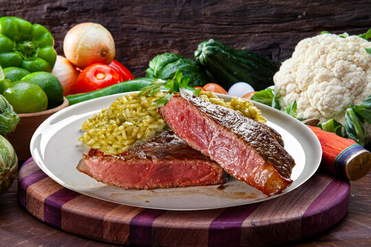 Slices of grilled filet with risotto