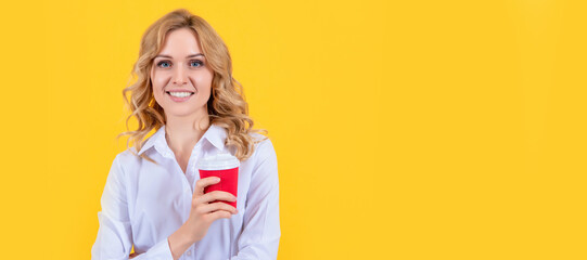 blonde woman smile with coffee cup on yellow background. Woman isolated face portrait, banner with mock up copy space.