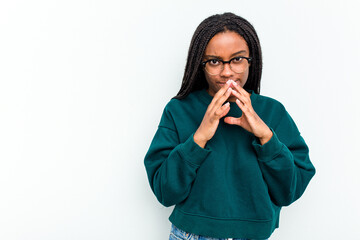 Young African American woman isolated on white background making up plan in mind, setting up an idea.