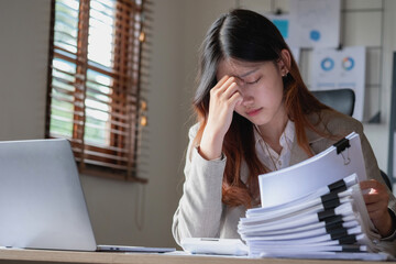 Concept Burnout Syndrome. Business Woman feels uncomfortable working. Which is caused by stress,...