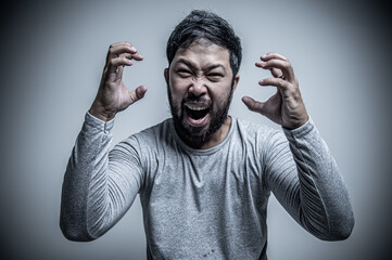 Asian handsome man angry on white background,Portrait of young Stress male concept