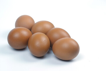 Small group of Chicken eggs on white background. Top view