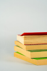 stack of colorful books isolated