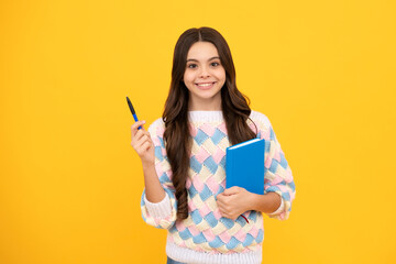 Teenager school girl with books isolated studio background.