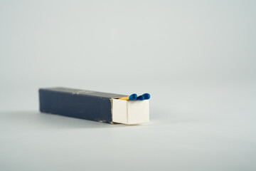 blue matches come out of the matchbox