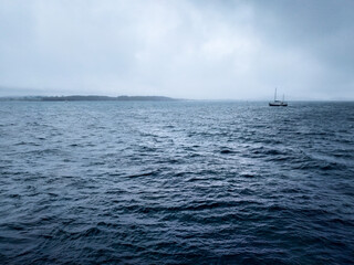 Obraz premium UK, Isles of Mull and Iona - September 8, 2019: casual photos of live style and architecture on the islands at the cloudy weather