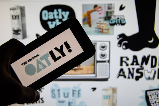 Rheinbach, Germany  23 October 2021,  The brand logo of the Swedish food company "Oatly" on the display of a smartphone (focus on the brand logo)