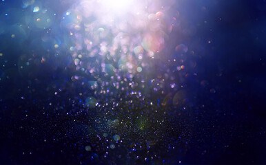 Fototapeta na wymiar Abstract background of glitter lights. De-focused background. 