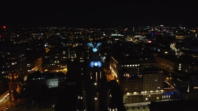 Aerial drone view of Liverpool city and port at night, United Kingdom