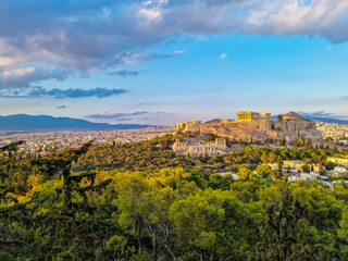 Panoramic view during sunset of the Parthenon of the Acropolis seen from Filopappou Hill, Athens,...