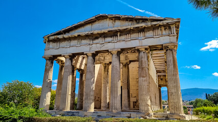 Scenic view of the temple of Hephaestus and Athena Ergane Agora, Athens, Attica, Greece, Europe. Ruins of ancient agora, birthplace of democracy and civilisation. Building dedicated to greek gods