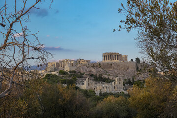 Panoramic view during sunset of the Parthenon of the Acropolis seen from Filopappou Hill, Athens,...