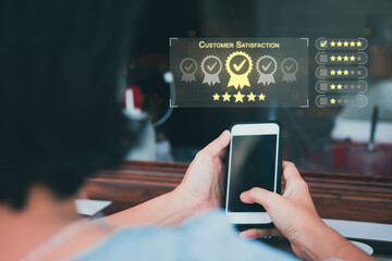 Blurred woman holding smatphone and give rating to service experience on online application background with Customer review satisfaction feedback survey concept, quality, service, business ranking.