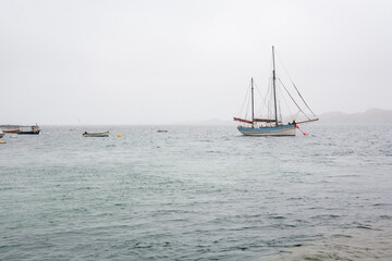 Obraz premium UK, Isles of Mull and Iona - September 8, 2019: casual photos of live style and architecture on the islands at cloudy weather