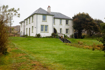 Fototapeta na wymiar UK, Isles of Mull and Iona - September 8, 2019: casual photos of live style and architecture on the islands at cloudy weather