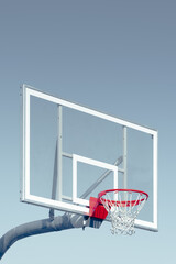 basketball hoop against blue sky vintage film edit
