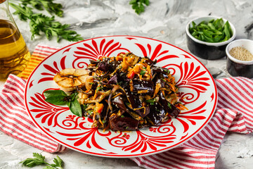 eggplant salad. Hot spicy stewed eggplant in Korean, with tomatoes, paprika, carrot, onion and garlic