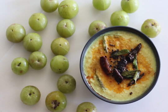 Nellika curry. Kerala style coconut based Gooseberry curry made of fresh gooseberry, ground coconut and spices