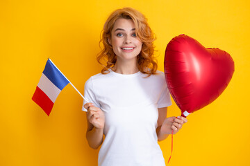 France flag. Happy woman holding flag of France and red heart balloon, immigration and travelling in Europe. France school or university concept. - obrazy, fototapety, plakaty