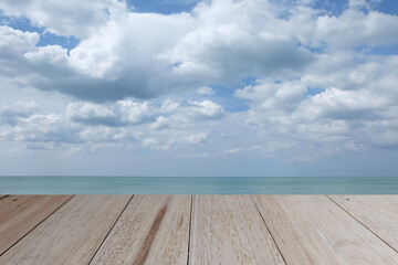 wooden table with sea and clouds is background wooden table
