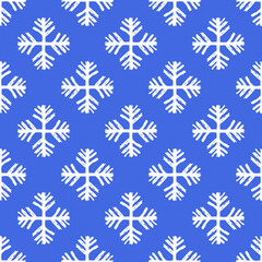 Small white ink snowflakes isolated on blue background. Cute monochrome Christmas seamless pattern. Vector simple flat graphic hand drawn illustration. Texture.