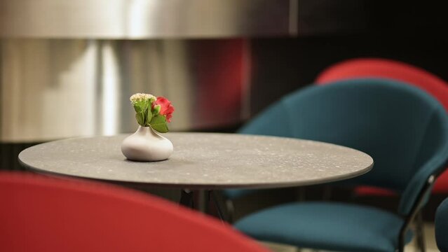 Table in a cafe, on a reception with flowers