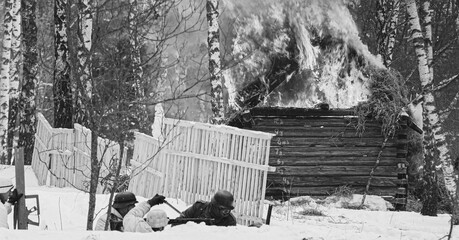 Men Dressed As German Wehrmacht Infantry Soldiers In World War II Hidden Sitting With Weapon In An...