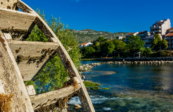 Old water wheel on the river