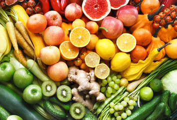 Fresh ripe bright colorful fruits and vegetables from market, summer farm harvest background, fruit rainbow concept
