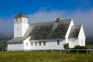 White wooden Slotten church at Havoysund scenic route, Norway