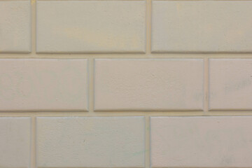 Classic white cream large brick background, Abstract geometric pattern texture, Vintage outdoor brick block wall, Can be used as background for display or montage your products.
