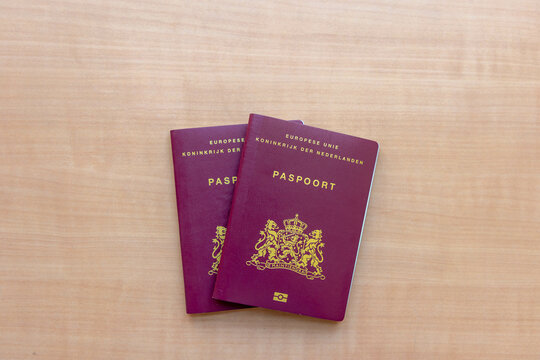 Traveling document and immigration concept, Dutch passport (Nederlands paspoort) are issued to citizens of the Kingdom of the Netherlands for the purpose of international travel. 