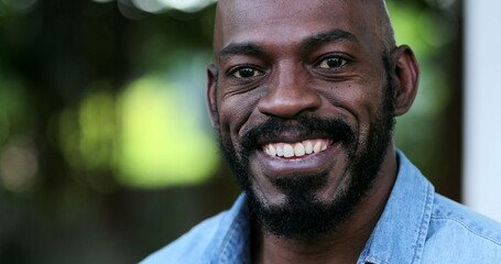 Fototapeta premium Confident black African man smiling portrait