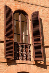 Window With Shutters On A Tuscan House