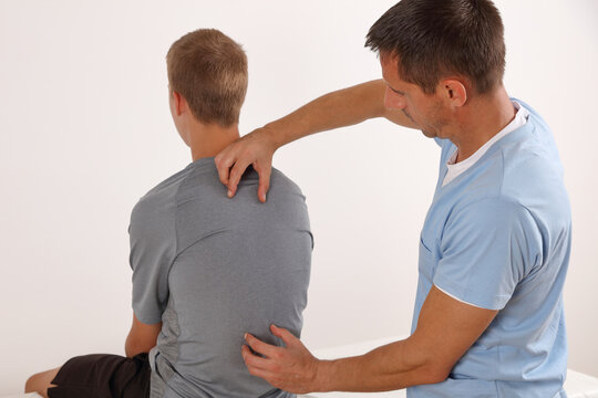 Adolescent Posture Correction. Chiropractic treatment, Back pain relief. Physiotherapy concept