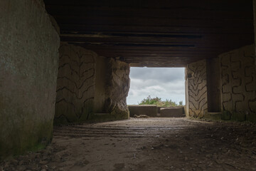 Inside an empty german bunker of the Second World War, remains of the Atlantic Wall at Omaha Beach,...